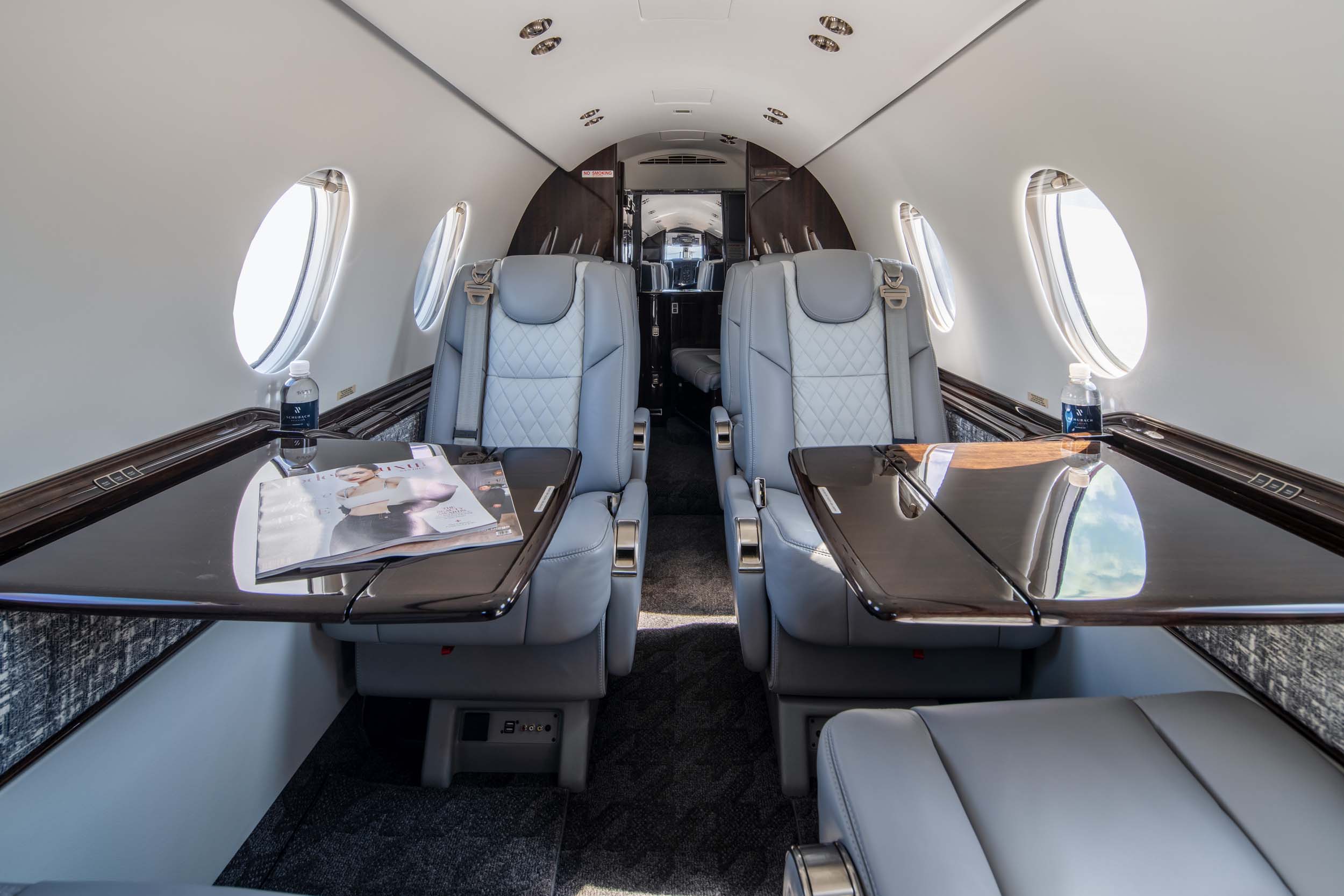 Hawker Beechjet 400 private jet interior seats and tables